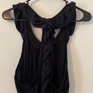 Low back back with ruffles! Pic doesn’t do it justice. So cute